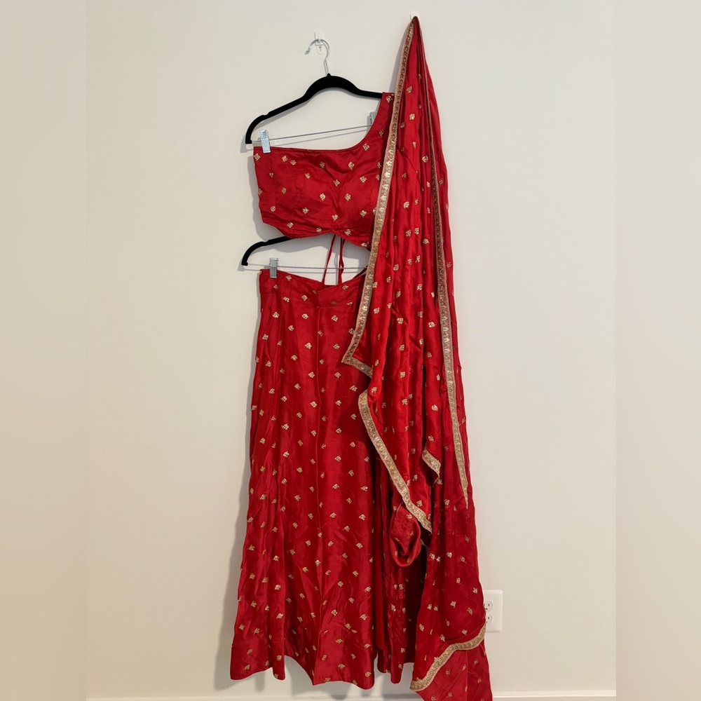 Red one shoulder lengha with slit
